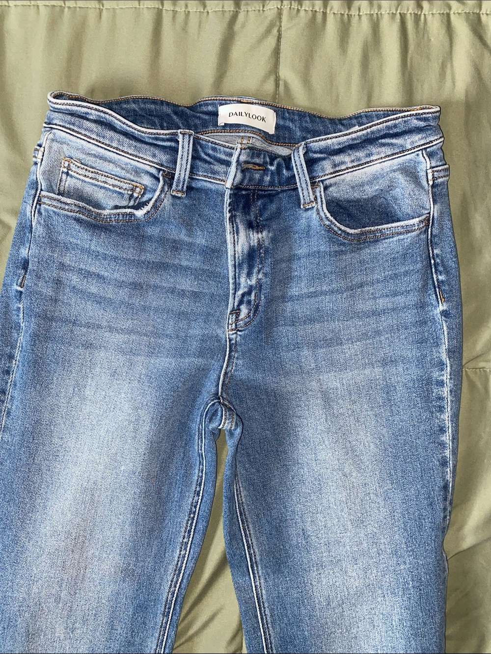 Daily Look, Women’s stretch, ankle length jeans. Worm once. Form fitting.